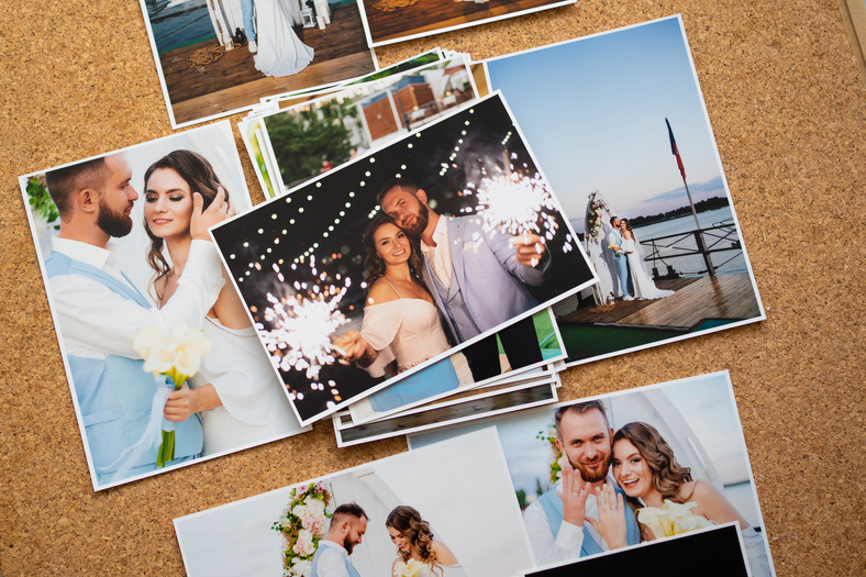 a printed copy of the wedding photos. the result of a photo session